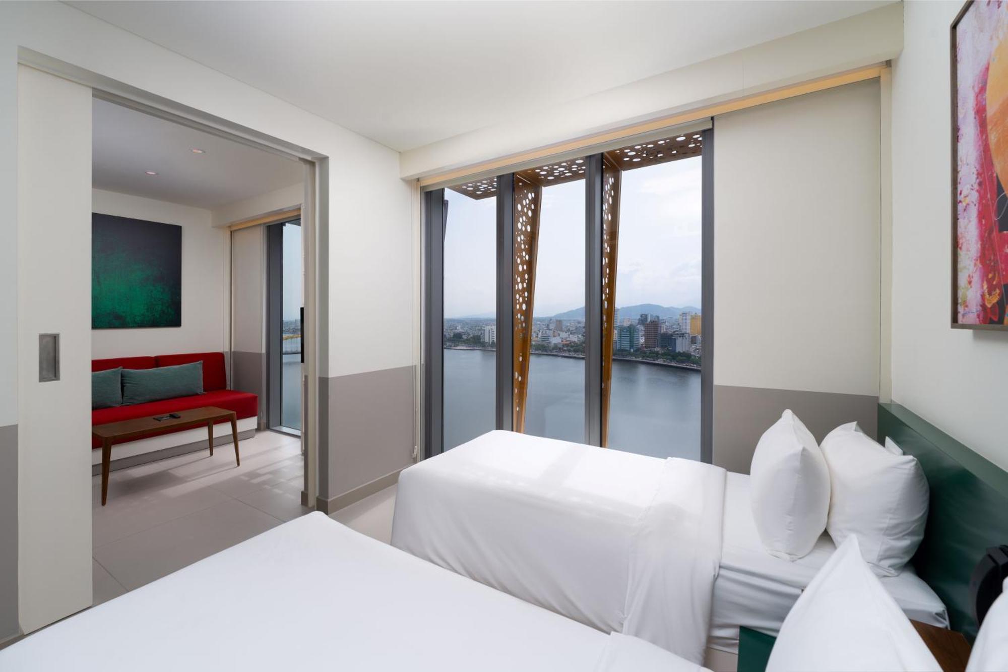 Wink Icon Hotel Danang Riverside - Luxury Suites - 24Hrs Stay & Rooftop Pool Bar מראה חיצוני תמונה