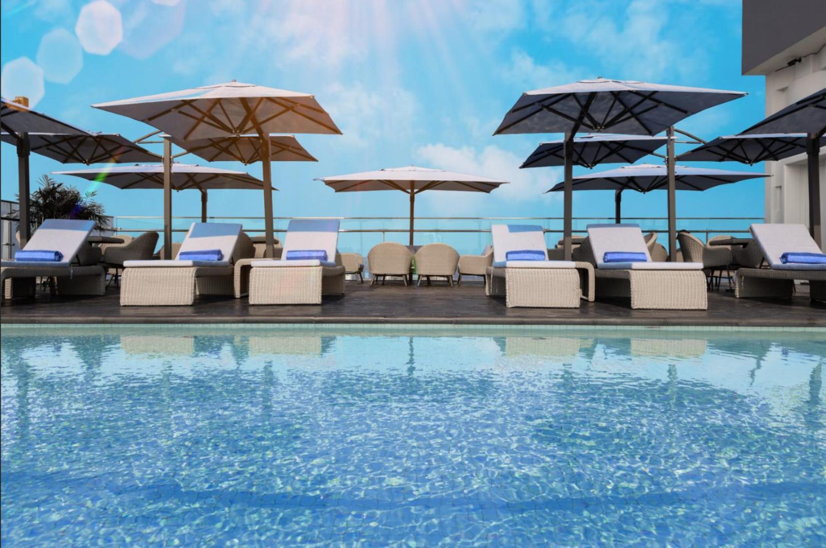 Wink Icon Hotel Danang Riverside - Luxury Suites - 24Hrs Stay & Rooftop Pool Bar מראה חיצוני תמונה